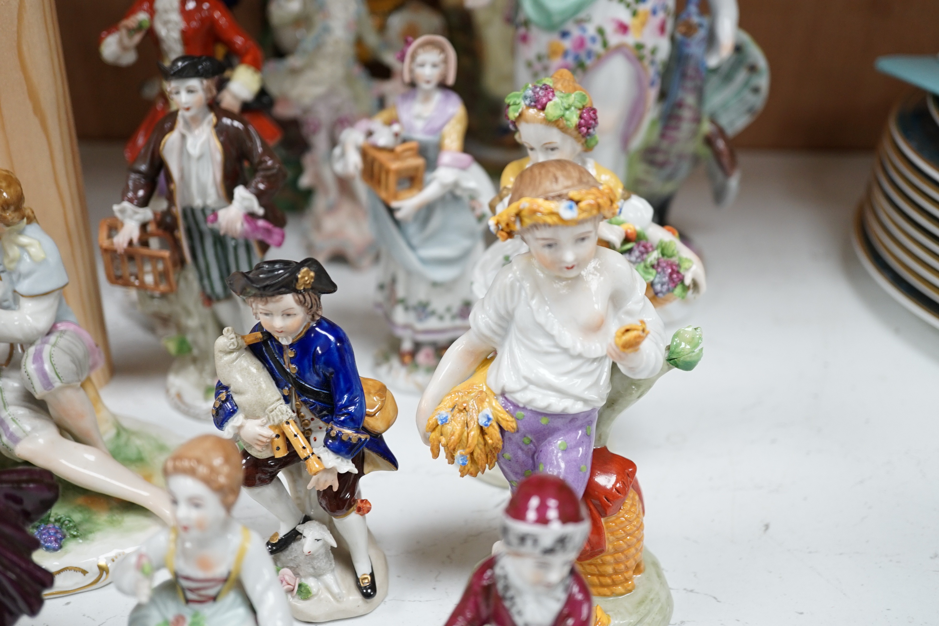 A mixed selection of 20th century porcelain figures, tallest 27cm